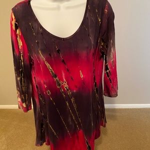 Cute top with jeans or leggins. Asymmetrical hemline and 3/4 length sleeves